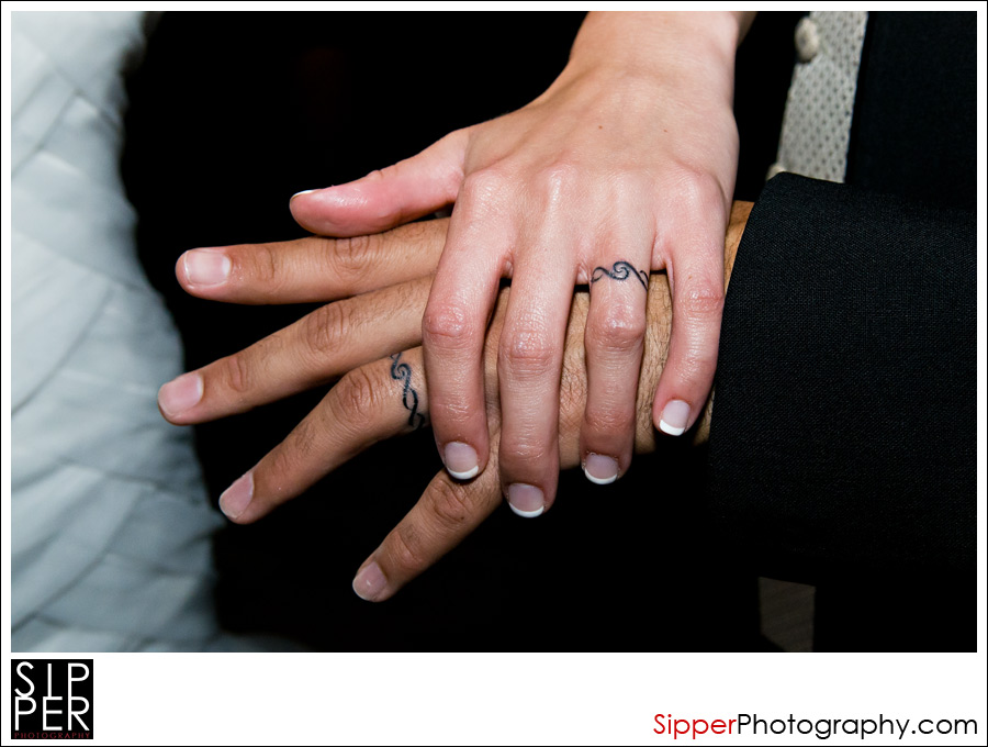 Tattooed wedding ring fingers