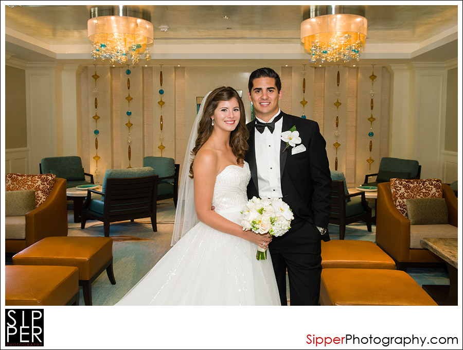 Wedding Couple photographed in the hotel lobby of the Balboa Bay Resort